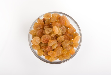 Pile of raisins or black currant on a white backgroundの写真素材