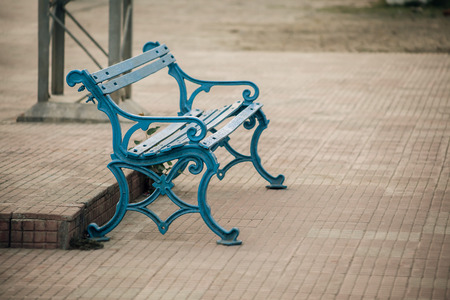 Railway station old blue chair bench at plat form in indiaの写真素材