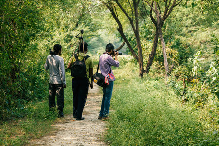Indian photography lovers in outdoor taking photos. with tripod.のeditorial素材