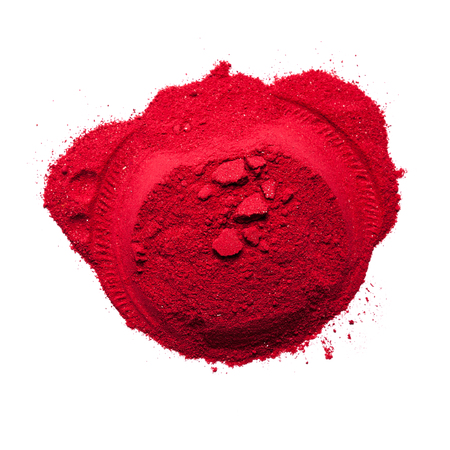 Top view close up of red color made of soil on white background.の写真素材