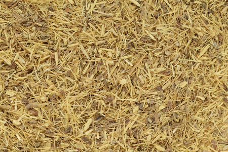 Organic dry Liquorice or Mulethi (Glycyrrhiza glabra) tea cut. Macro close up background texture. Top view.の写真素材