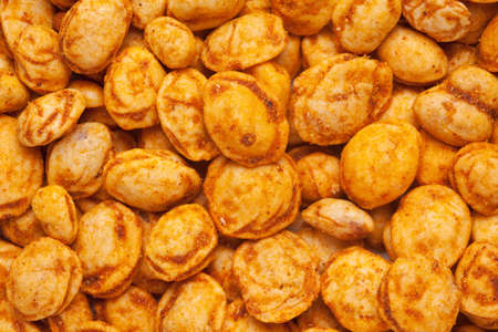 Roasted Crunchy Peanuts in full-frame wallpaper, made with peanuts and coated besan. Indian spicy...