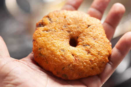 Plain dry dahi badhe for preparation of chaat, Garnished with cumin and green fresh corianderの写真素材