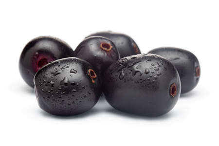 Close-Up of collection of Indian Ayurvedic medicinal fresh organic fruit jamun (Syzygium Cumini) or black plum isolated in white background.の写真素材
