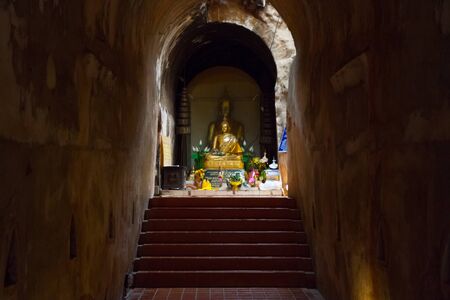 Buddha statue at Wat U-Mong with prayers on stone sign in Thai language, Chiang mai, Thailandの写真素材