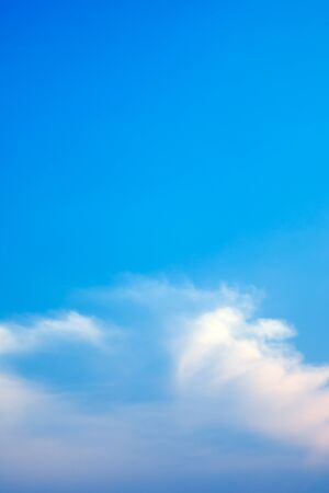 Blue sky and White cloud - with copy space in vertical viewの写真素材