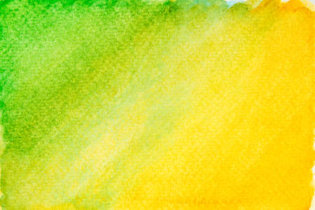 Hand painted green and yellow watercolor texture background.の写真素材