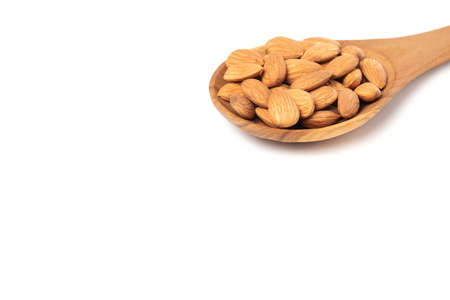 Almond seeds in the wooden spoon. No clipping path.の写真素材