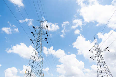 The high voltage pole in the sky and white clouds