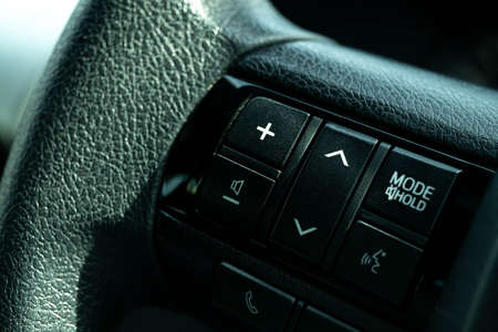 The in-vehicle operation buttons, car audio controls, volume up, down, next track, previous ,...