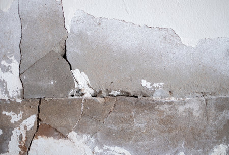Cracked concrete wall broken wall at the outside cement corner that effected with earthquake and...