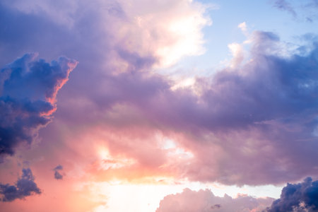 beautiful gradient orange clouds and sunlight on the blue sky perfect for the background, take in everning,Twilightの写真素材