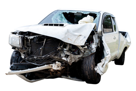 Front and side of white pickup car get damaged by accident on the road. damaged cars after collision. isolated on white background with clipping path, car crash bumper on the road for graphic design elementの写真素材