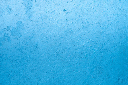 Abstract light blue stucco Background. Wall building Close up. Rough Surface plaster Texture With Copy Space for designの写真素材