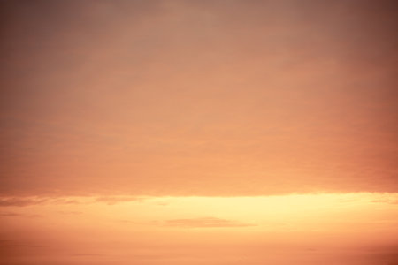 Beautiful , luxury soft gradient orange gold clouds and sunlight on the blue sky perfect for the...
