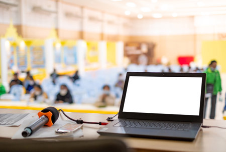 Background image of opened laptop with blank white screen on customer meeting,Presenting the results of annual business operations, copy spaceの写真素材