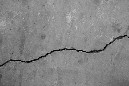 Cracked concrete wall broken wall at the outside cement corner that effected with earthquake and...