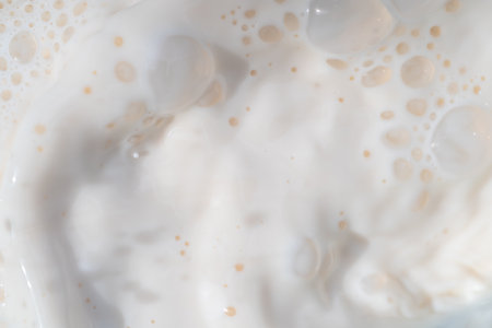 Milk water liquid white color drink and food texture background, Beautiful natural caw milk wave and...