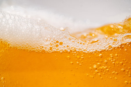 Close up bright orange Oil splash texture and nature waves, Beautiful waves curve and little bubbles smooth for graphic design and background, Oil Bubbles, Selective focusの写真素材