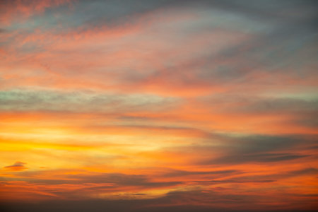 Sky,Beautiful sunset view, luxury soft gradient orange gold clouds and sunlight on the blue dramatic...
