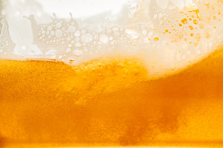 Close up bright orange splash texture and nature waves, Beautiful waves curve and little bubbles...