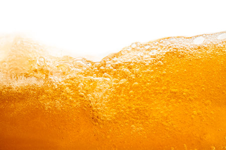 Close up bright orange Oil splash texture and nature waves, Beautiful waves curve and little bubbles...