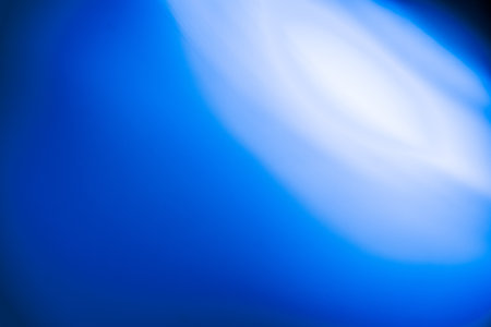 Abstract blue and white blurred light background. Blurred motion gradient mix color background. Ideal for use in creative design, marketing materials, tech visuals, and modern graphic art projectsの写真素材