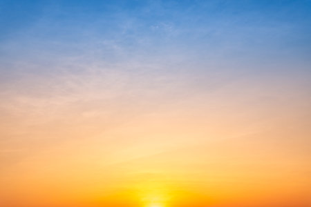 Beautiful luxury soft gradient with orange gold clouds and sunlight on the blue sky perfect for the...