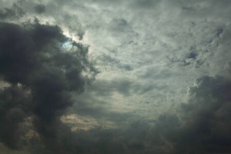 the sky and clouds change color in gray, before the rain falls, because there is a stormの写真素材