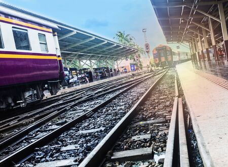 train station with train waiting for tourists to travel out of the province on weekends to relaxの写真素材