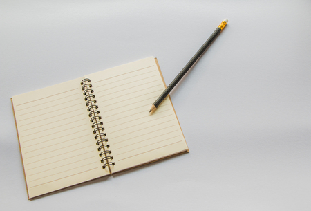 Book Pencil  On white background.の写真素材