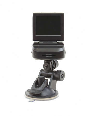 car video recorder in black on the suction cup to the glass