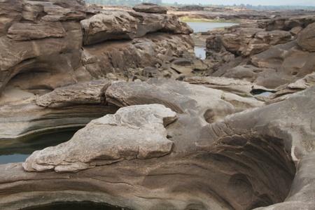 Traces of  a stone  The traces of the river eroded the rock into a beautiful trail along the banks of the Mekong River between Thailand and Laos の写真素材