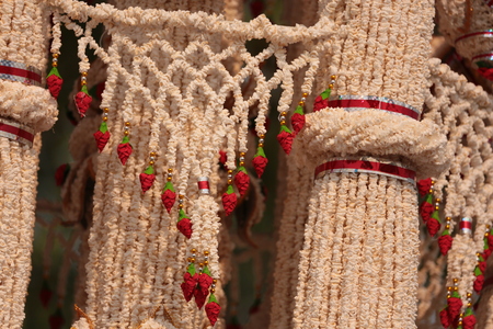Garlands made of popped Marchers to worship the faith of the Prophet by Buddhists in Thailand, Yasothon.の写真素材