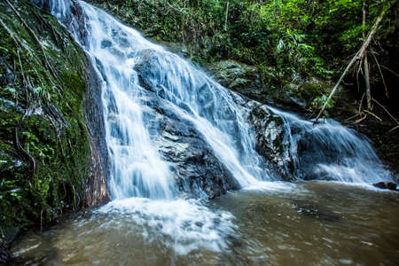 Beautiful small waterfall in rain forest at Maekampong, Chiang Mai, Thailand.の写真素材