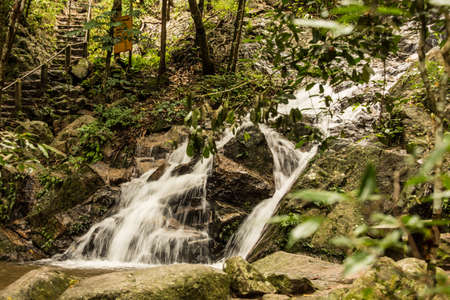 Beautiful small waterfall in rain forest at Maekampong, Chiang Mai, Thailand.の写真素材