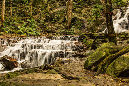 Beautiful small waterfall in rain forest at Maekampong, Chiang Mai, Thailand.の写真素材