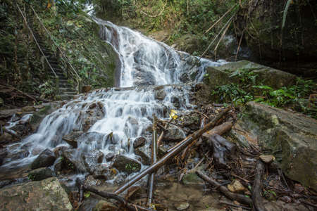 Beautiful small waterfall in rain forest at Maekampong, Chiang Mai, Thailand.の写真素材