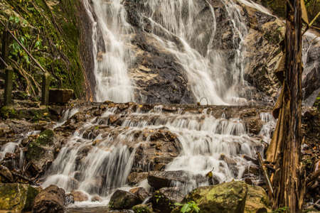 Beautiful small waterfall in rain forest at Maekampong, Chiang Mai, Thailand.の写真素材