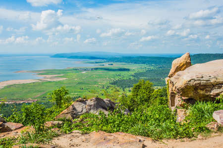 Nature backgrounds/Dramatic clouds and river with mountain and tree: Hin chang si view piont at Nam phong national park khon kaen province Thailand.の写真素材