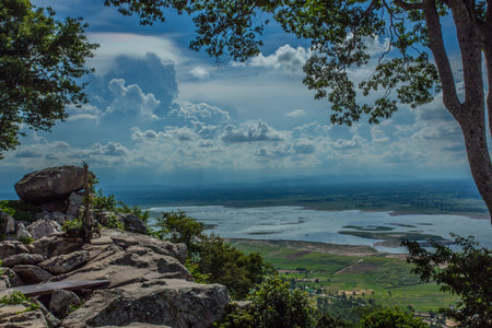 Nature backgrounds/Dramatic clouds and river with mountain and tree: Hin chang si view piont at Nam phong national park khon kaen province Thailand.の写真素材