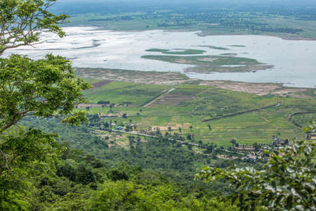 Nature backgrounds/Dramatic clouds and river with mountain and tree: Hin chang si view piont at Nam phong national park khon kaen province Thailand.の写真素材