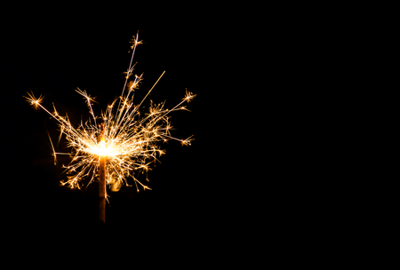 Christmas sparkler on black background. Bengal fireの写真素材