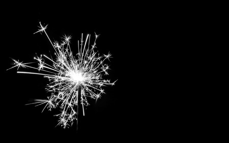 Christmas sparkler on black background. Bengal fireの写真素材