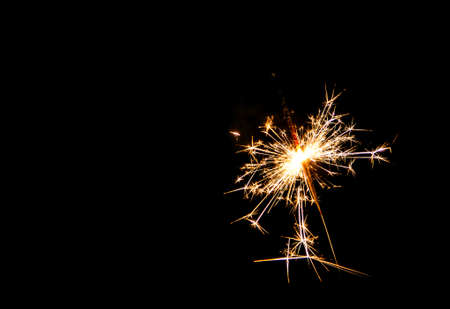 Christmas sparkler on black background. Bengal fireの写真素材
