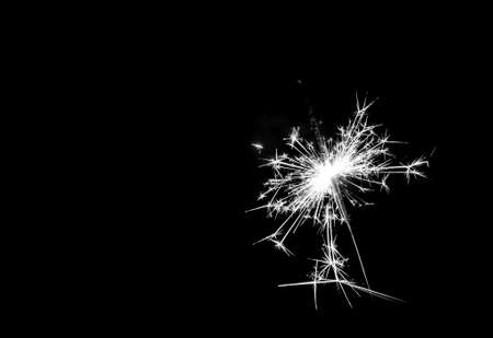 Christmas sparkler on black background. Bengal fireの写真素材