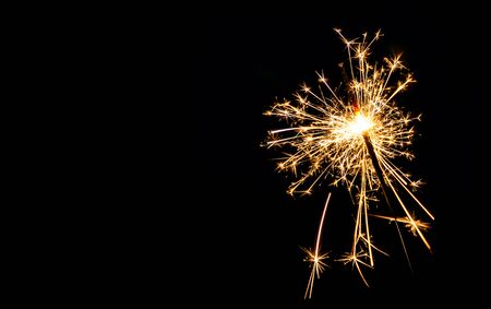 Christmas sparkler on black background. Bengal fireの写真素材