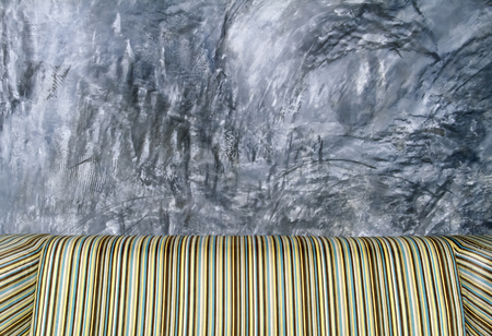 Sofa with a cement floorの写真素材