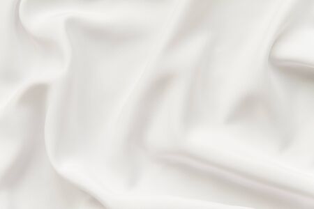 abstract background luxury cloth or liquid wave or wavy folds of grunge silk texture satin velvet material or luxurious Christmas background or elegant wallpaper design, backgroundの写真素材