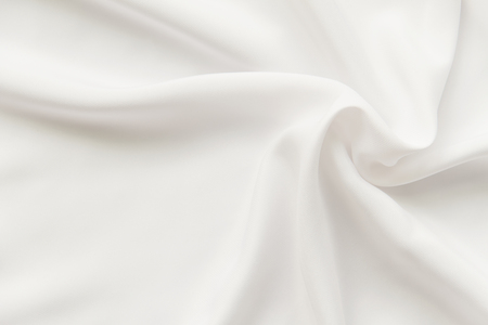 abstract background luxury cloth or liquid wave or wavy folds of grunge silk texture satin velvet material or luxurious Christmas background or elegant wallpaper design, backgroundの写真素材